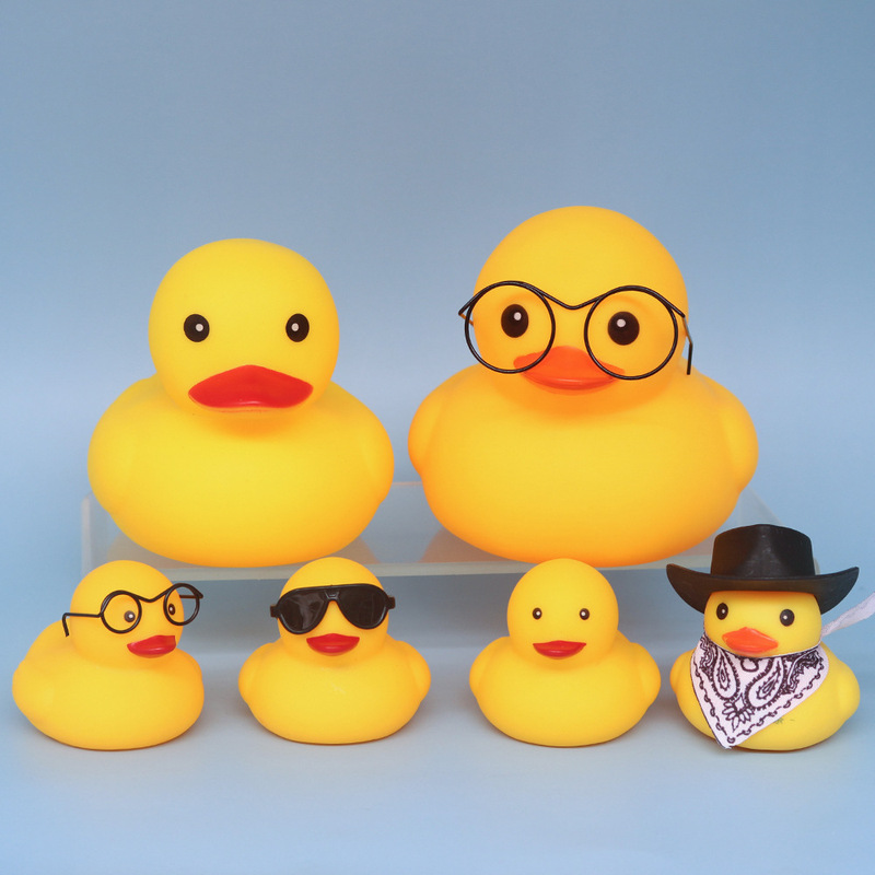 Hong Kong version of the little duck toy baby bath water play 8 little yellow duck toy children's educational pinch called voice