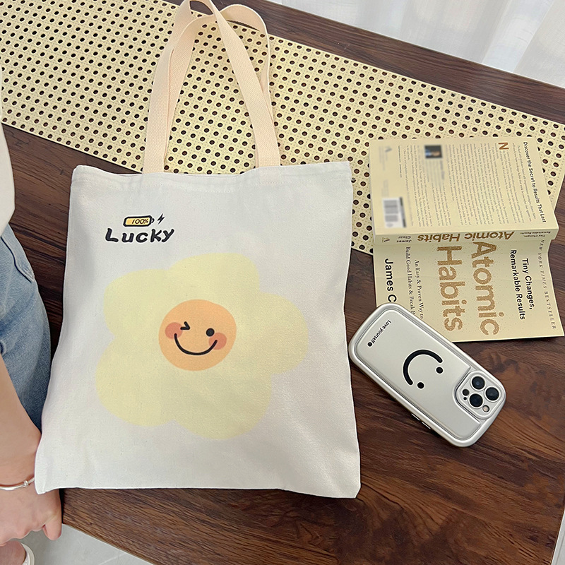 ファッションのキャンバスの小さい包みの女性のかわいい弁当は野菜の包みを買います2025春夏の新型の現物の子供のハンドバッグの日系|undefined