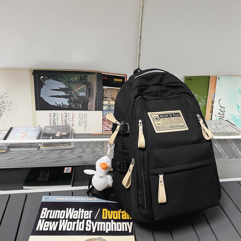 Nueva mochila femenina estudiante universitario estudiante de secundaria estudiante de escuela secundaria estudiante chica mochila simple gran capacidad niños mochila al por mayor