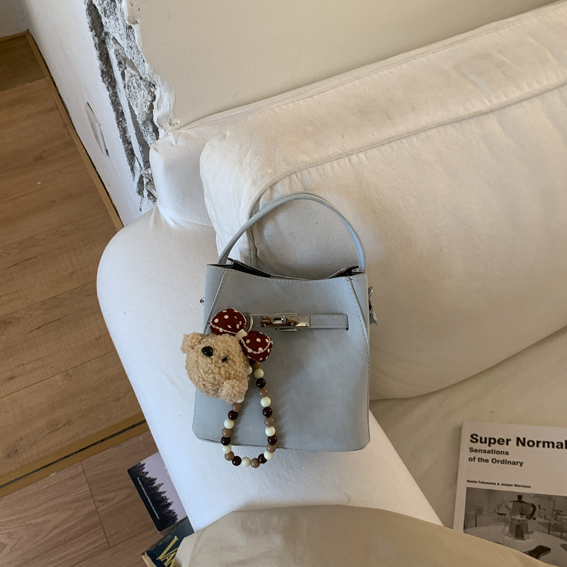 Cross-border 2026 nuevo estilo coreano nicho Zhong bolso de cubo de agua super caliente mujer de viaje universal temperamento casual mochila diaria