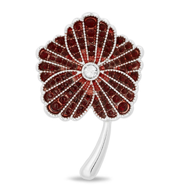 commemorative red brooch