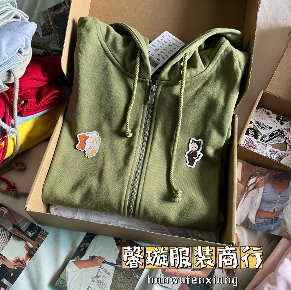 Bm風ブランディ同タイプの女性コートの純色のゆったりしたジッパーと帽子のカーディガン
