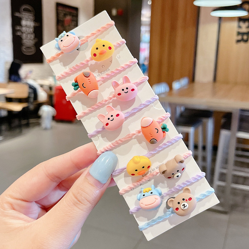 Los niños de la banda del pelo del bebé de la historieta no lastiman la banda de goma del pelo de la niña volumen del pelo menos cuerda del pelo del bebé