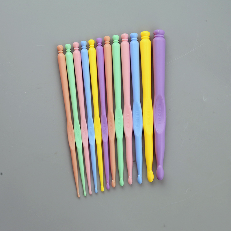 Cross-border color caramelo ABS color plástico herramienta de crochet herramienta de tejido de lana juego de crochet