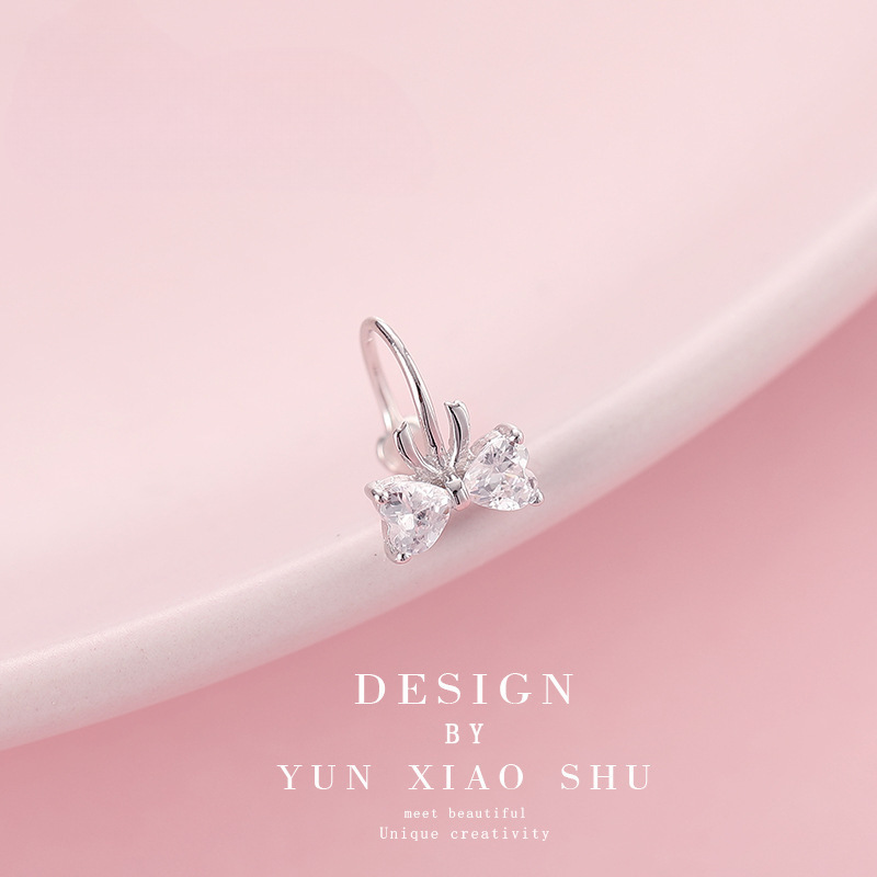 S orecchini in argento puro versione coreana con clip senza foro per l'orecchio e fiocco a farfalla intarsiato con zirconi_voghion.com