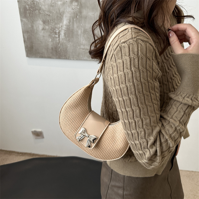 Bolsa debajo de la axila temperamento de alto valor facial bolso de mujer nicho de diseño bolso de hombro de invierno 2024 nuevo temperamento de arco mujer