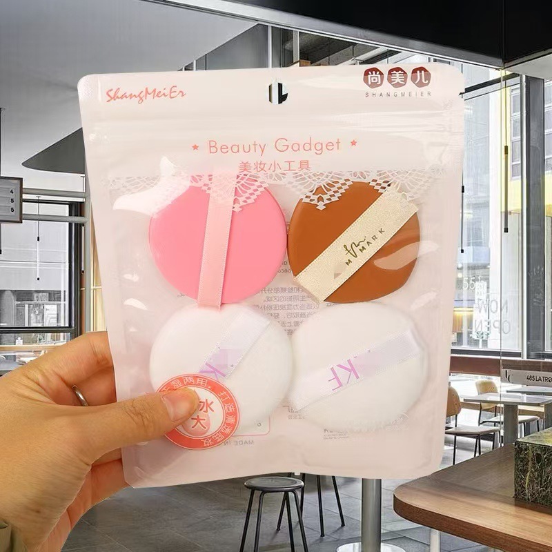 Polvo de cojín de aire con bolsa de almacenamiento huevo de maquillaje redondo dos conjuntos de polvo de marshmallow seco y húmedo al por mayor