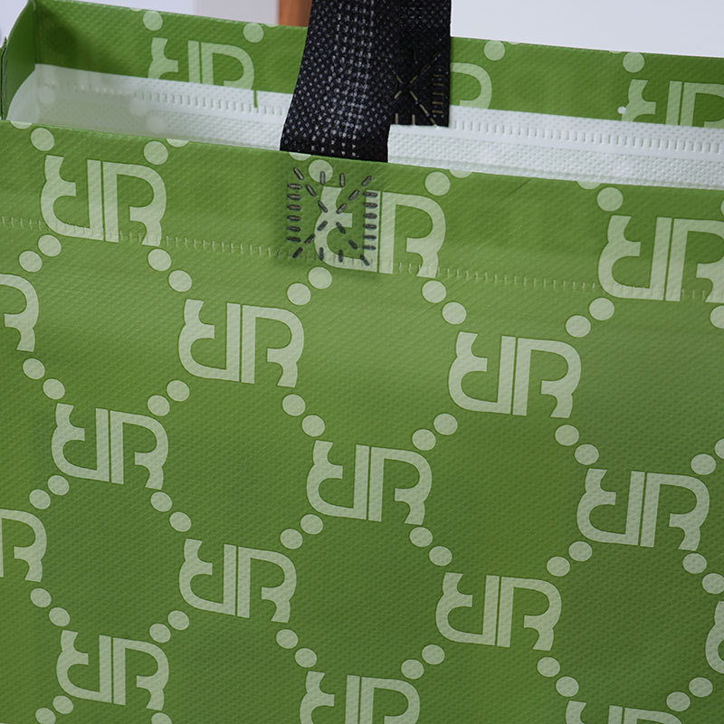 Bolsas de tela no tejida retro clásicas bolsas de compras portátiles publicitarias de ropa impresa en color bolsas de embalaje de película impresa personalizada stock