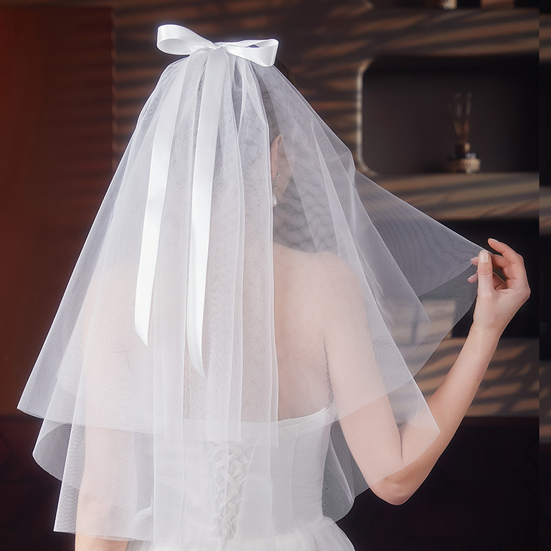 Short wedding dress with bow