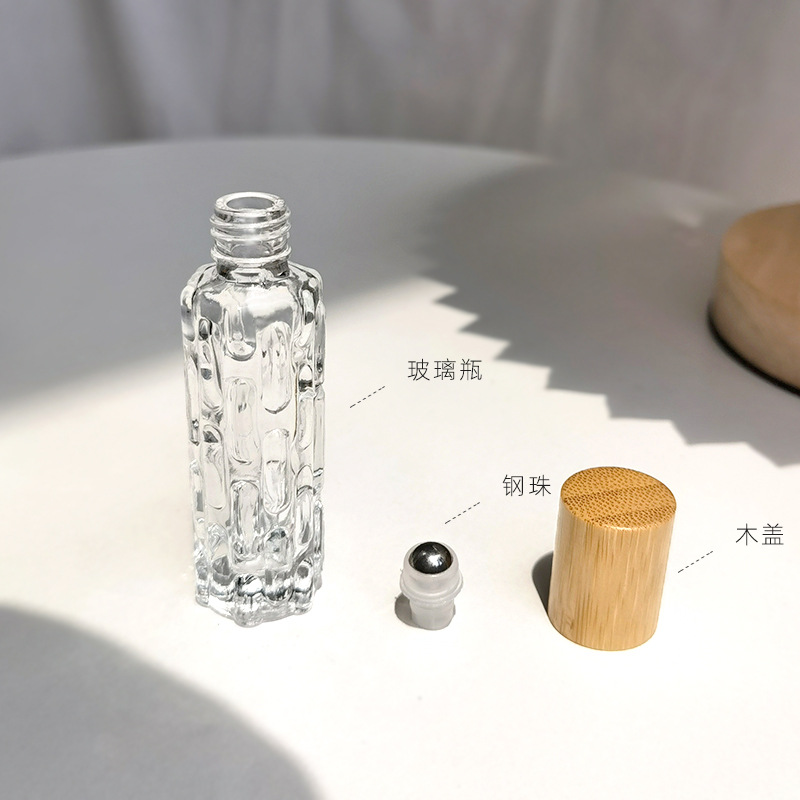 En stock al por mayor 10ml cubierta de bambú botella de bola de acero Bola de aluminio tapa electroquímica de aceite esencial sub-botella vacía
