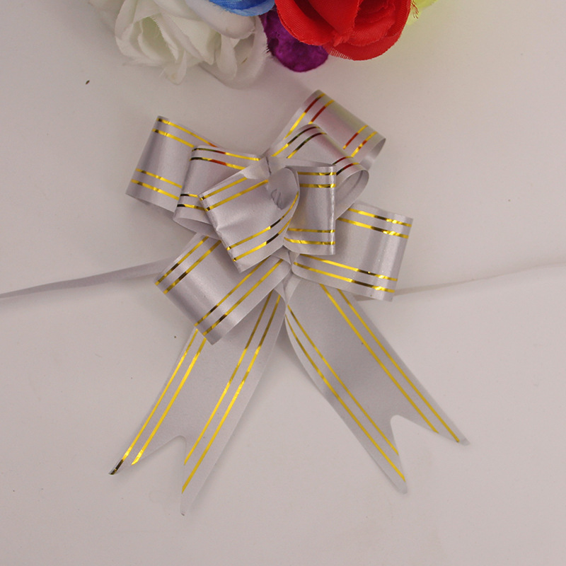 Fabricante al por mayor de empaques de flores para regalos navideños, cinta con borde dorado, 30 flores medianas atadas a mano.
