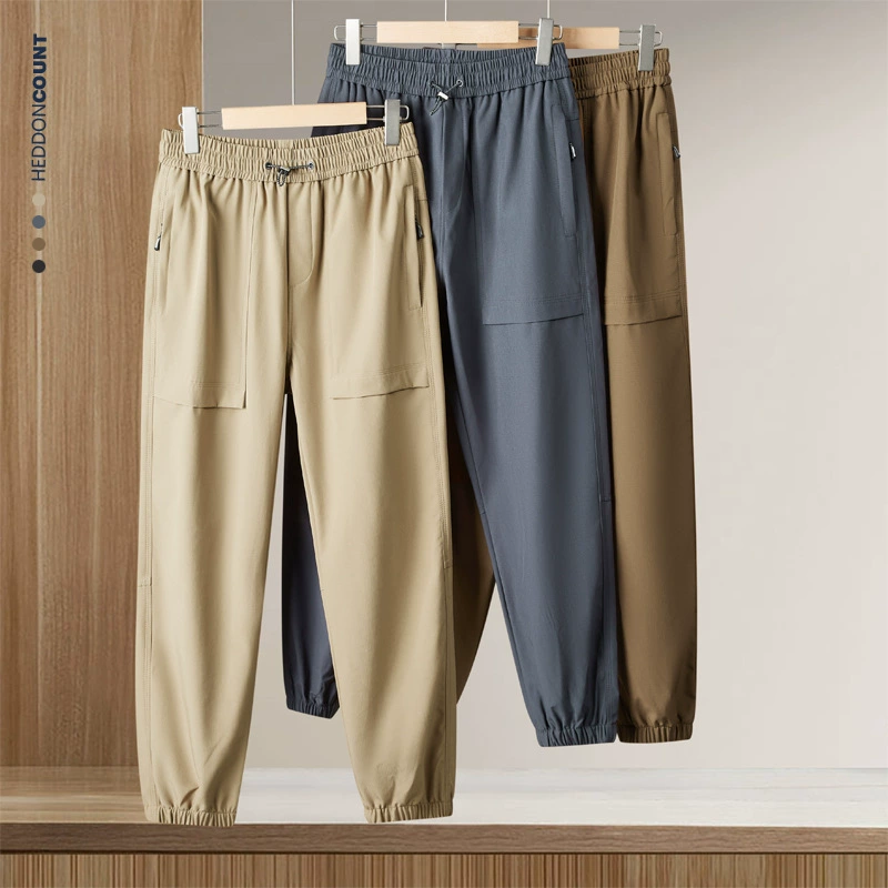 Dengjue мужская одежда 2025 весна и осень новые свободные повседневные брюки для мужчин на открытом воздухе карман карман брюки
