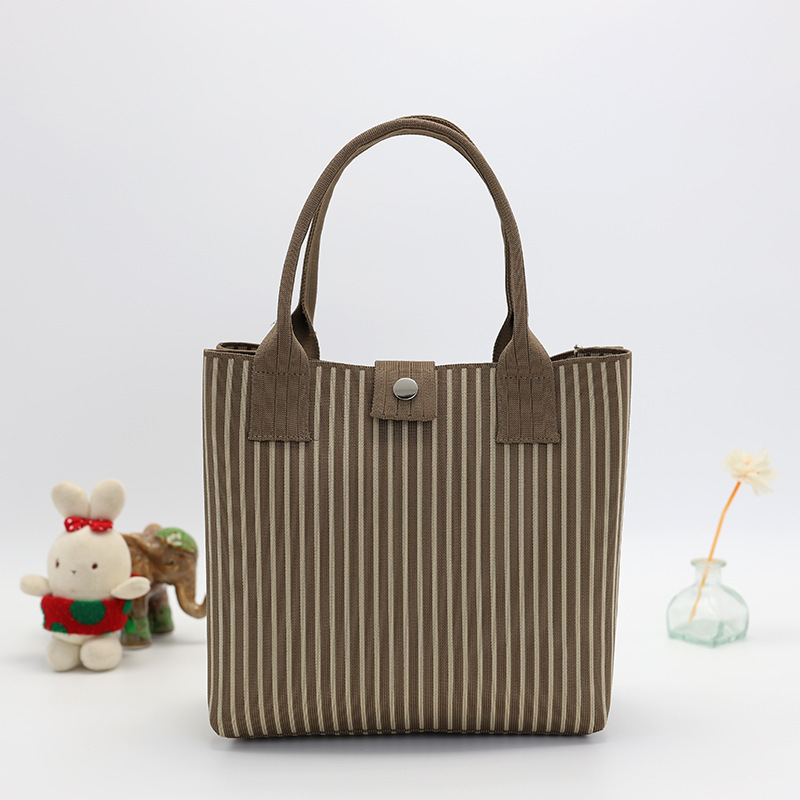 Japón y Corea del Sur tejido bolsas de mano bolsas de viaje de gran capacidad bolsas de compras de chicas fabricantes de bolsas H al por mayor