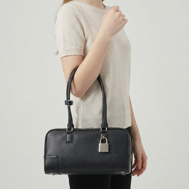Luxe designertas Niche Luojia Rundleer Onderarmtas voor Dames Europese en Amerikaanse Vintage Bowling Handtas Boston Tas Grote Capaciteit Authentiek_voghion.com