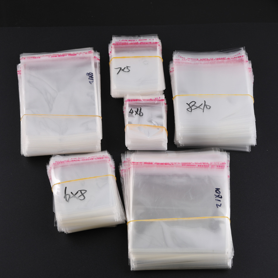 Accesorios de joyería de bricolaje bolsa de material bolsa opp bolsa de embalaje de plástico transparente bolsa de ropa bolsa autoadhesiva accesorios