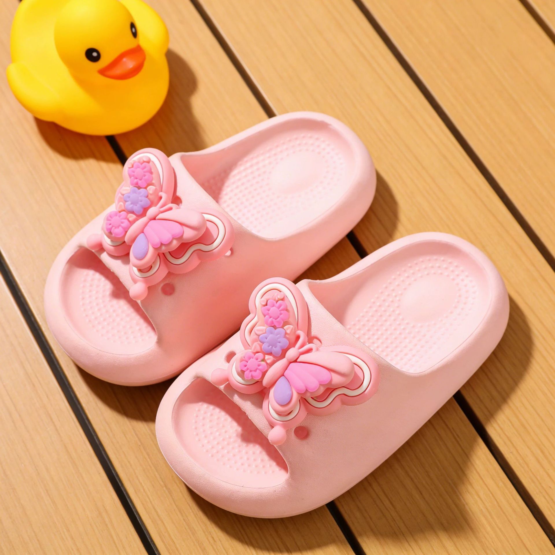 Cute bowknot children's slippers, EVA soft sole, non-slip bathroom bathing sandals, dopamine parent-child shoes, available for wholesale