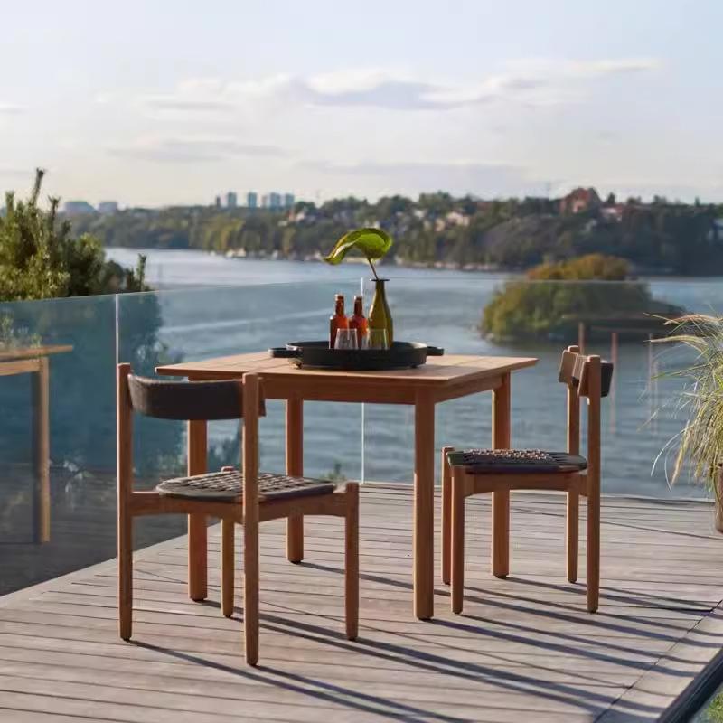 Mesa y silla de teca al aire libre Jardín patio balcón de ocio de madera maciza nórdica silla de ratana impermeable tres piezas combinación