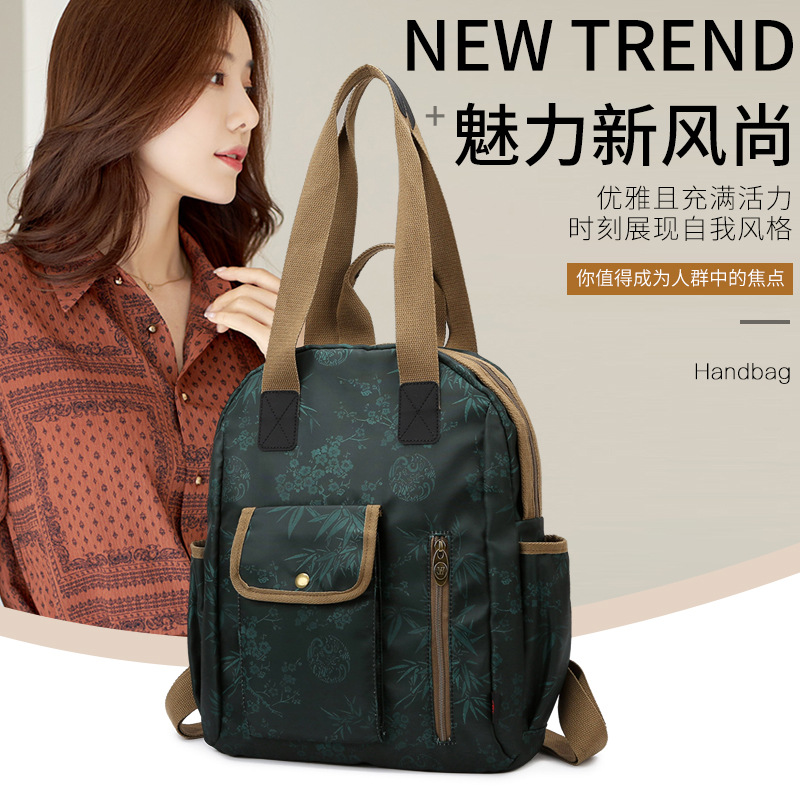 潮牌印花布艺休闲双肩背包复古手提出差旅游行李袋防盗防水大容量
