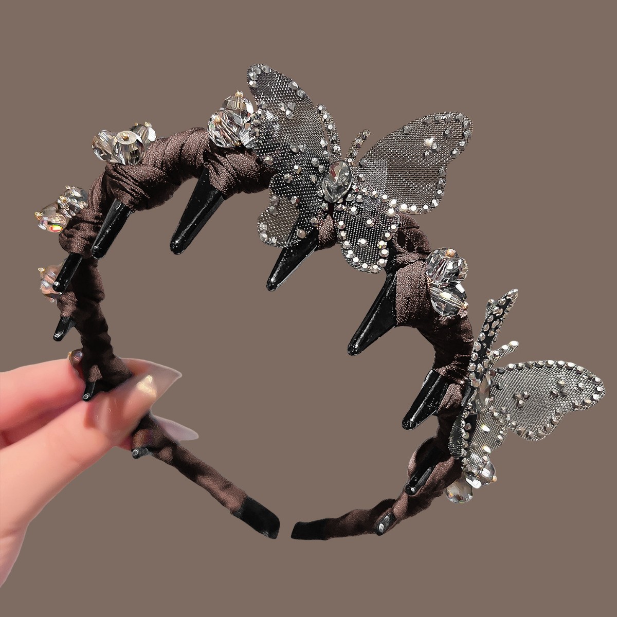 Brown silk cloth wrapped crystal butterfly