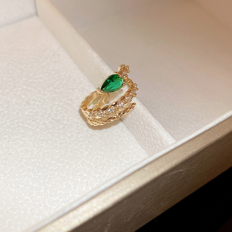 Oro real galvanizado verde circón serpiente en forma de serpiente oído clip de hueso personalizado creativo earless oído clip frío estilo temperamento pendientes