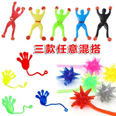 壁に登るスパイダーマンのおもちゃは神器を解凍して手のひらの子供の男の子のアイデアをくっつけます。