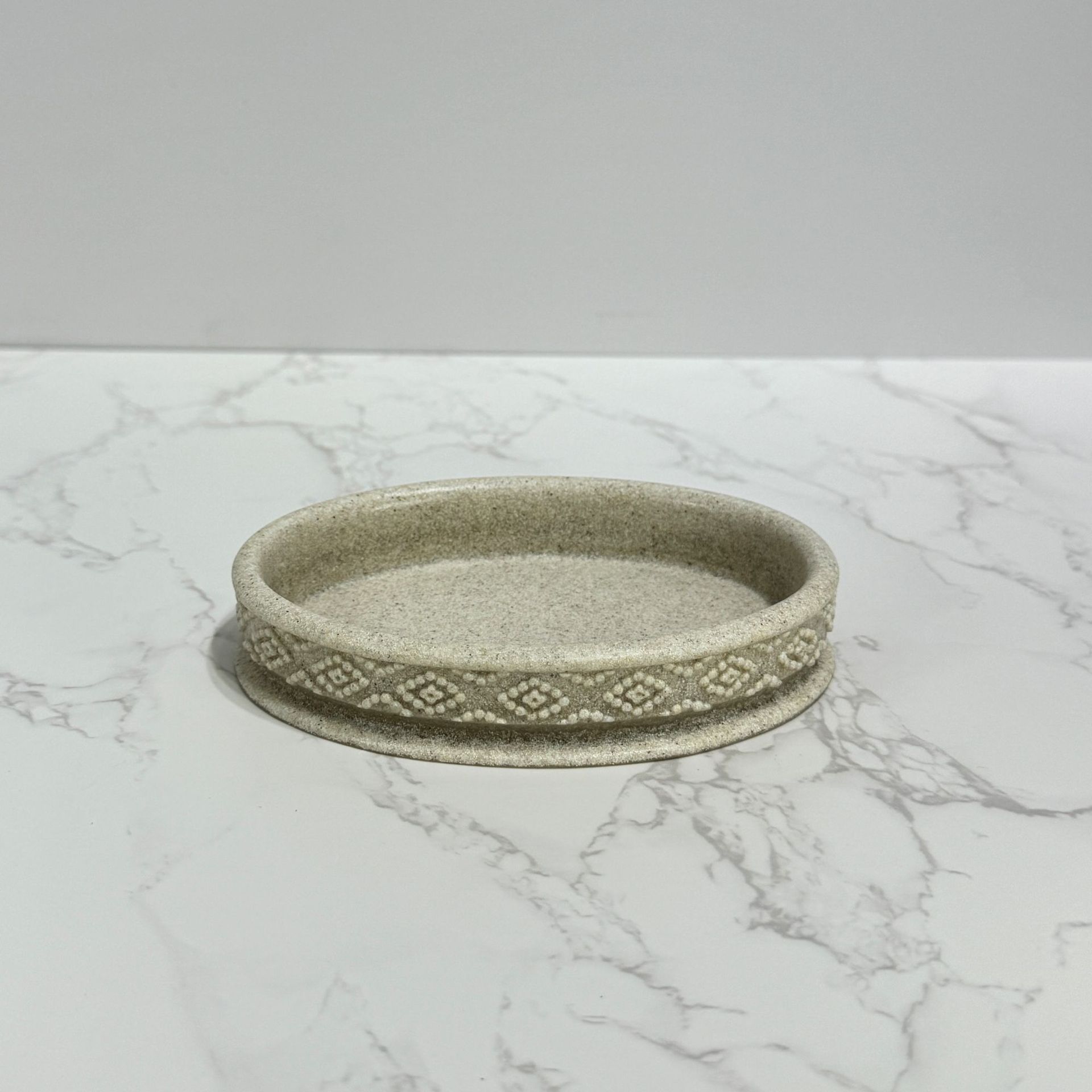 Diseño de piedra de arena imitación de resina set de enjuague de baño enjuague de baño de hotel decoración de piedra de arena set de cuatro piezas transfronterizo