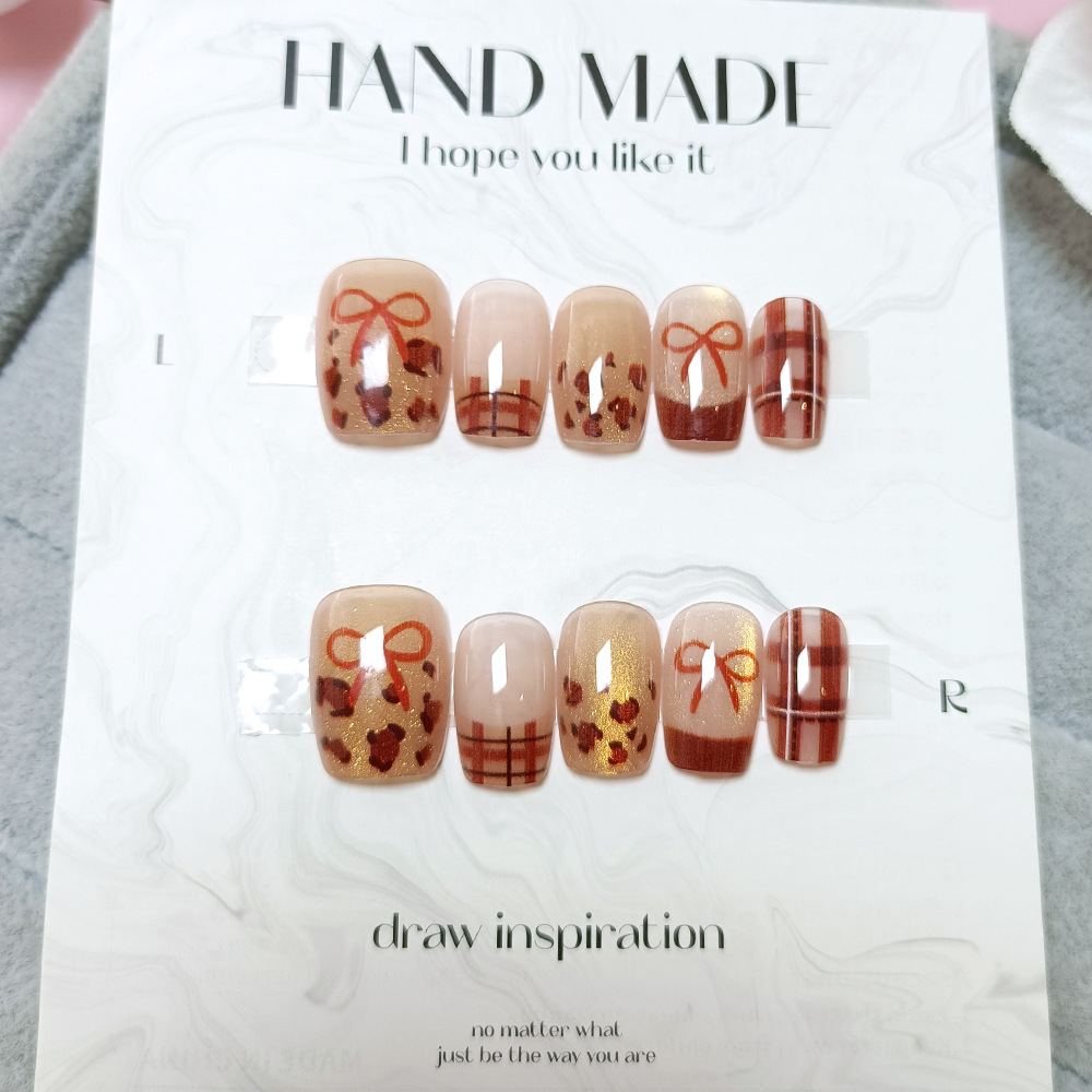 Año Nuevo usar piezas de uñas al por mayor productos terminados rojos carril pegatinas de uñas decodificado 10 piezas de piezas de uñas de ojo de gato
