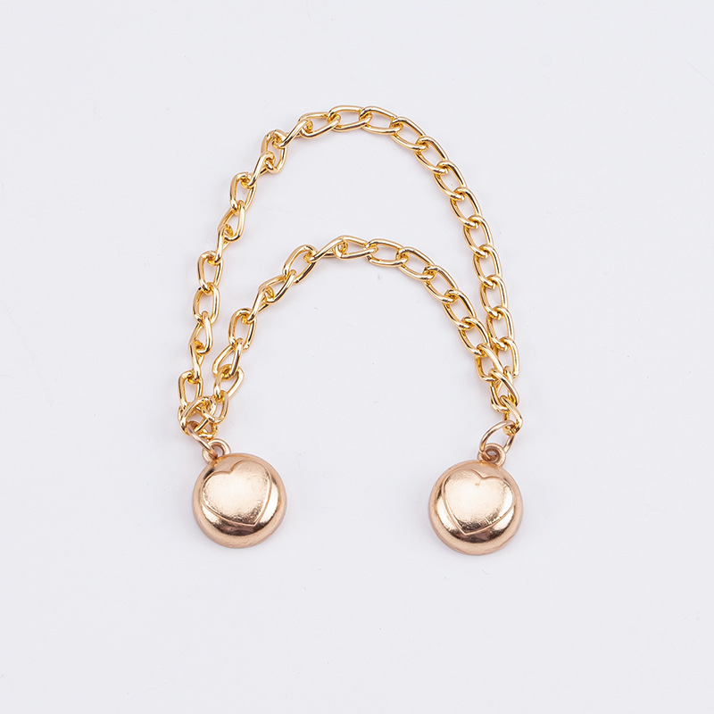 チェーンの磁気はズボンの足を引きずることを防ぎます。金属の磁気は袖口を固定します。