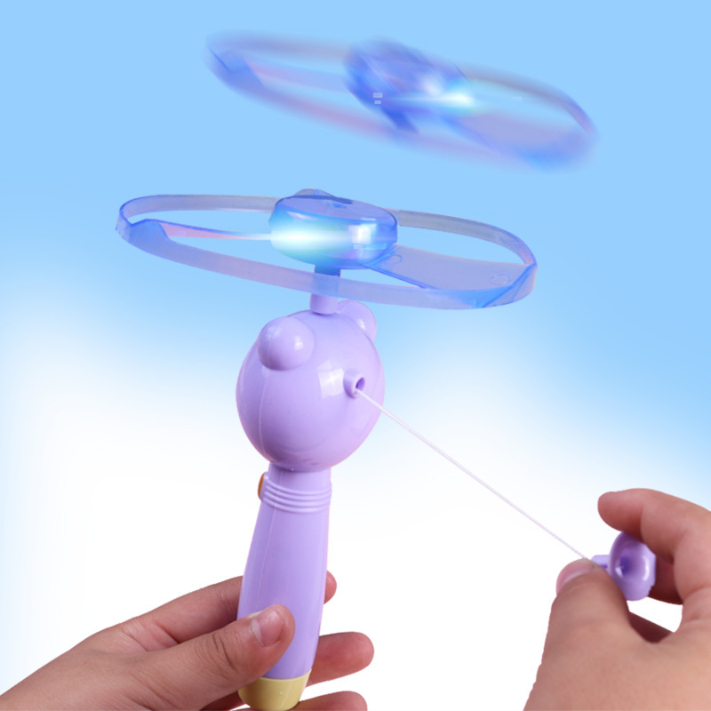 dibujos animados luminoso alambre de tracción mosquero mariposa iluminación de bambú libélula flash flash Frisbee empuje regalo para niños juguetes estandarte
