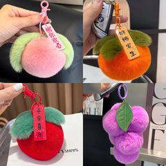 逸品の真毛のウサギのぬいぐるみの果物のキーホルダーは柿のブドウのリンゴの桃のかばんを掛けて贈り物を包みます。
