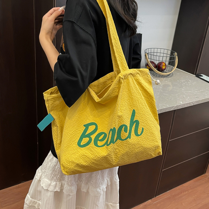 韓国版の新しいレタープリントカジュアル大容量トートバッグ軽量旅行多用途レイジースタイル巾着ショルダーバッグ|undefined