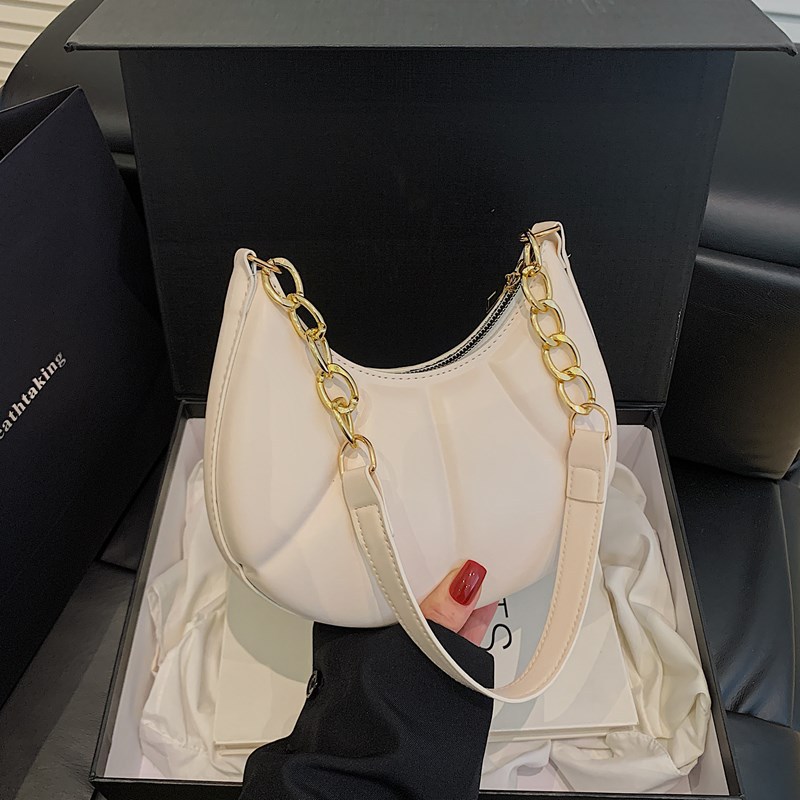 Bolsos tendencia femenina nuevo estilo 2025 primavera y verano todo-fósforo diseño de nicho textura popular de este año bolso pequeño de mensajero de axila