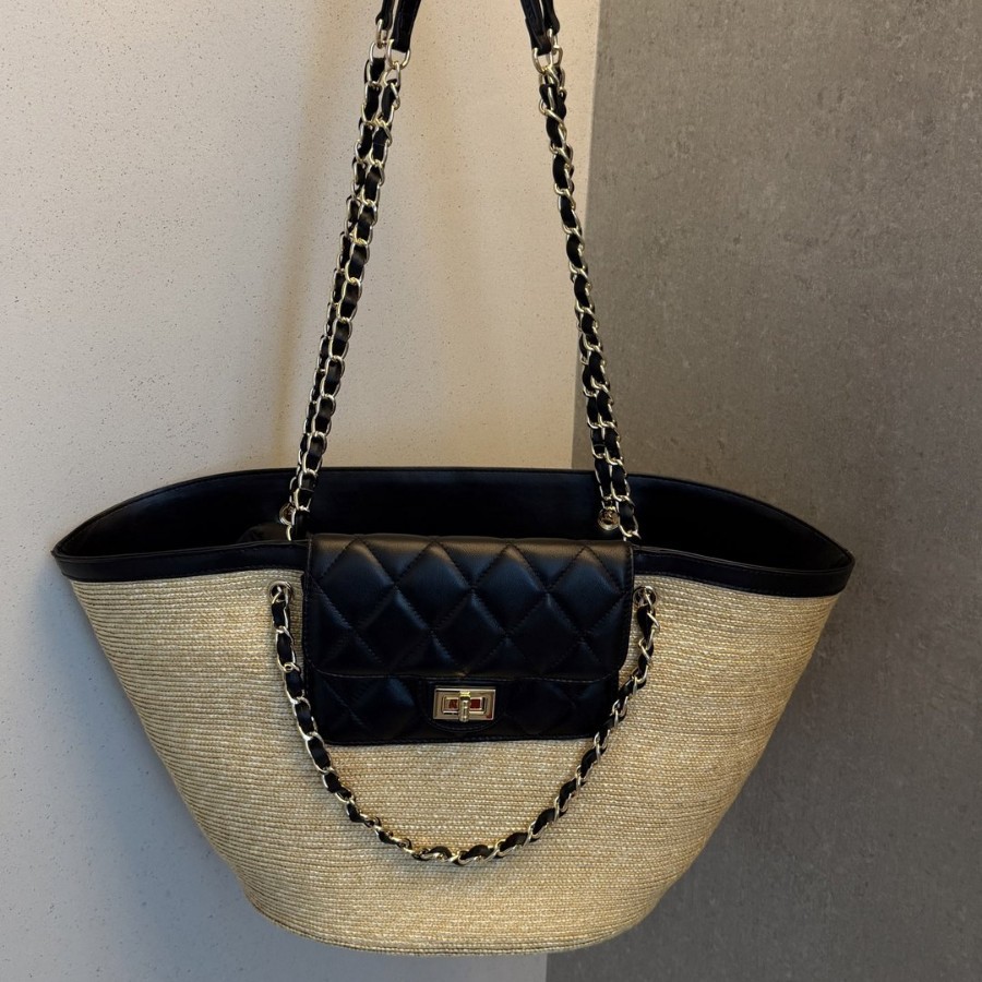 Bolsa de ombro em rattan trançado com acabamento em couro_voghion.com