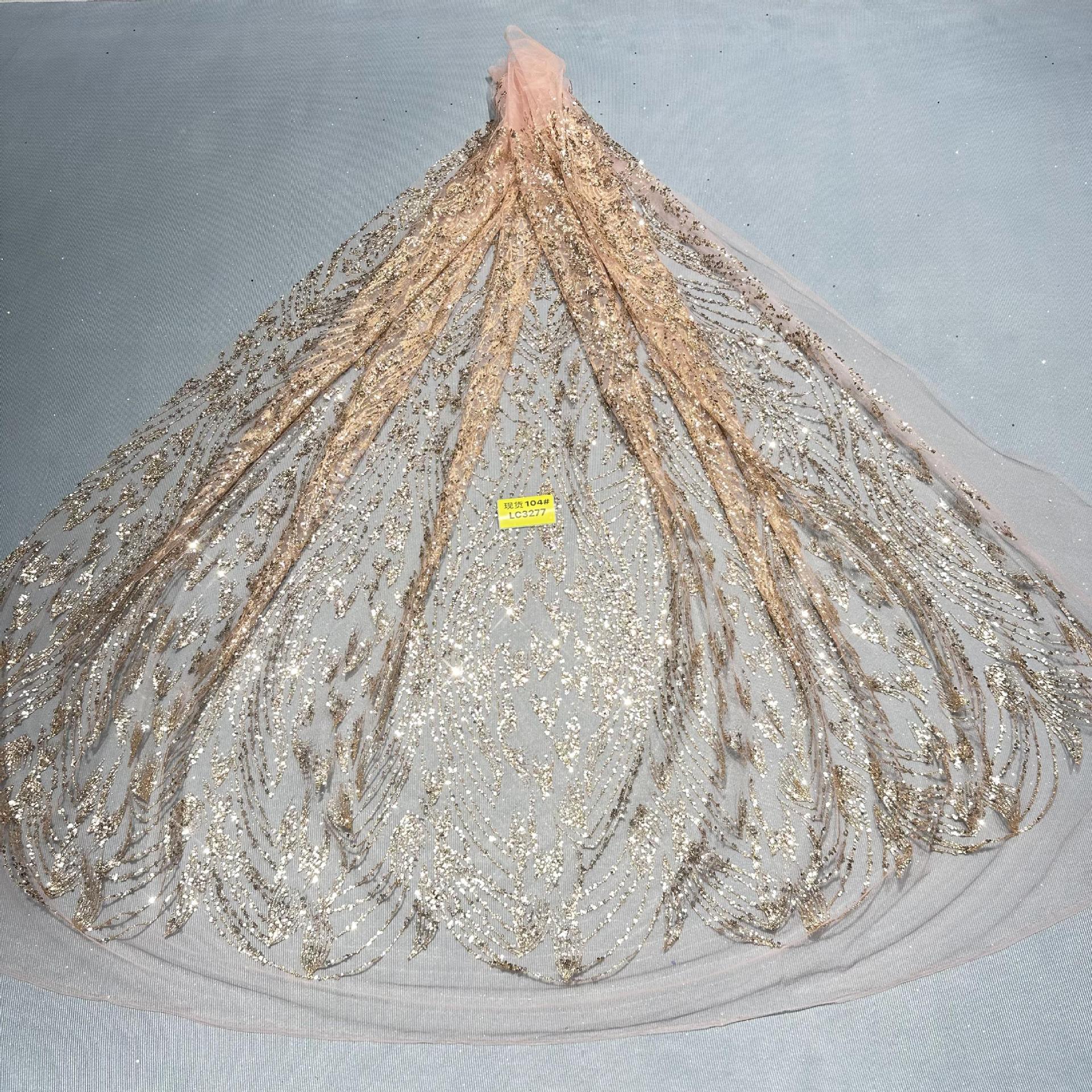 现货洒金花型款花型104#LC3277婚纱礼服面料 网纱 喷金花型面料