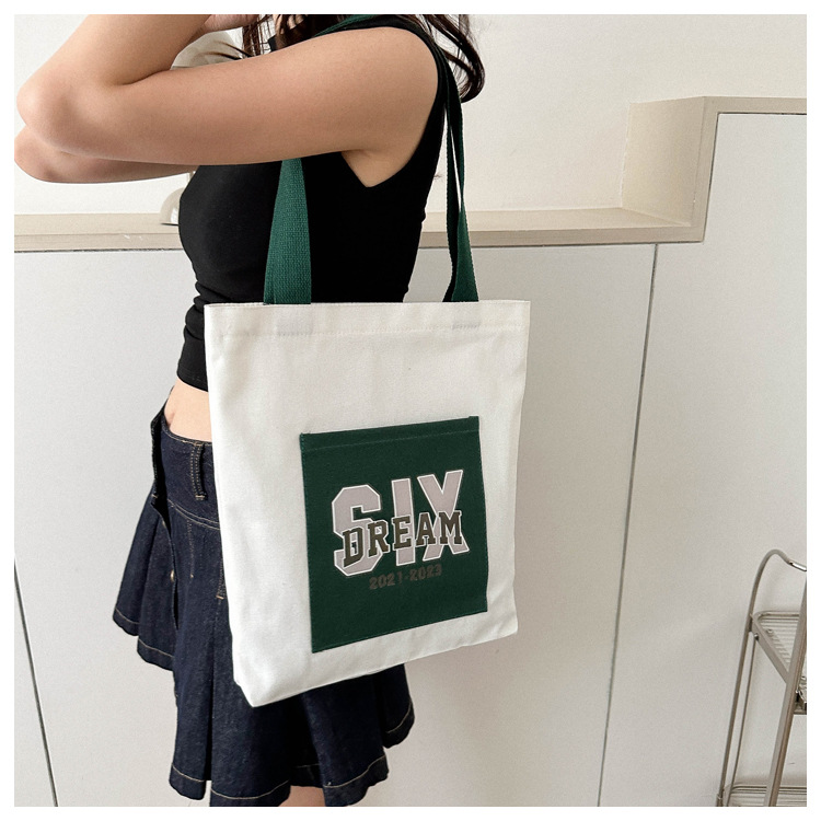 Wholesale of 2025 new casual and fashionable canvas bags, large-capacity single-shoulder bags for college students' shopping, and trendy tote bags undefined