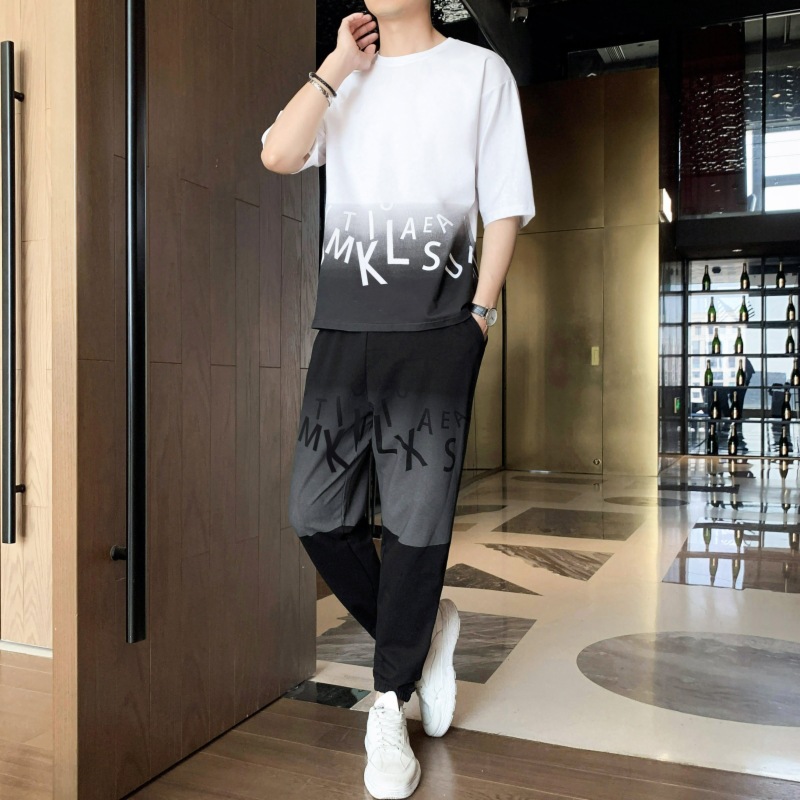 Dispositivo de deporte casual de hombre marca de moda camiseta de cuello redondo manga corta versión suelta de dos piezas conjunto de pies nueve puntos