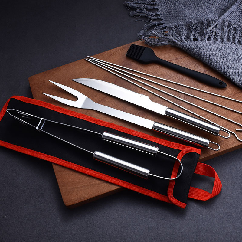 Fábrica directa de acero inoxidable BBQ set 9 piezas fuera del hogar conveniente bolsa de tela portátil herramienta de barbacoa
