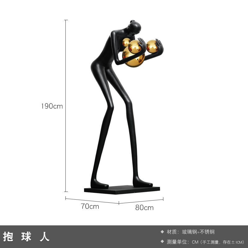 現代の抽象芸術はボールの人物の彫刻を抱きます。|undefined