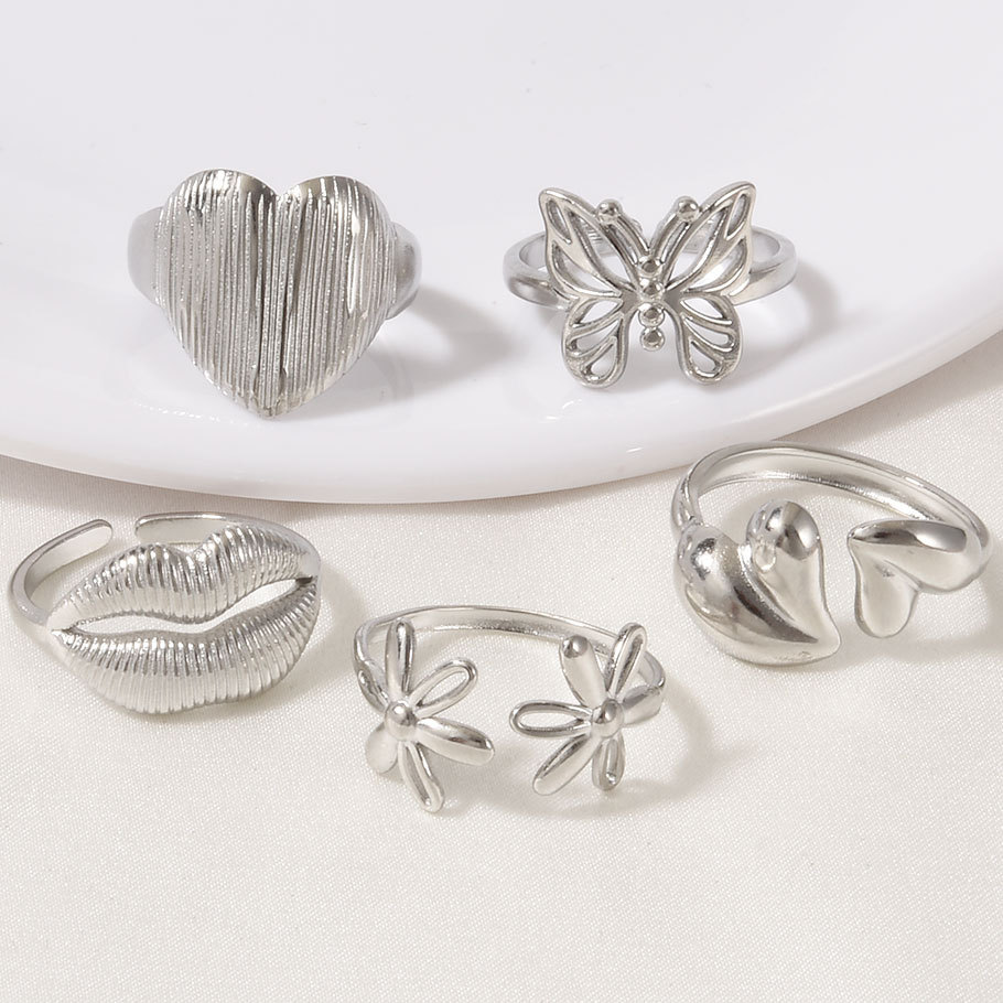 High-end Stainless Steel Couple Ring 18k Gold Hollow Pattern_voghion.com