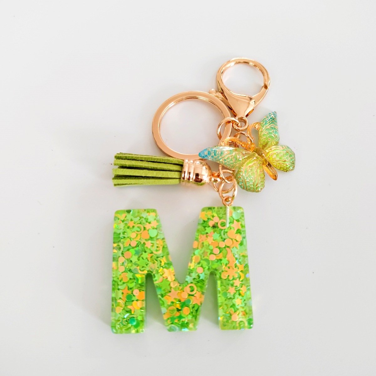 26 letras inglesas llavero colgante estrella verde brillo gota resina colgante llavero de personalidad europea y americana