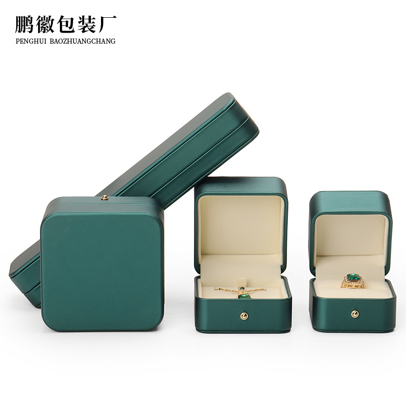 Caja de joyería de cuero de PU de borde dorado redondeado al por mayor caja de regalo de joyería de gama alta caja de reloj caja de joyería colgante de anillo