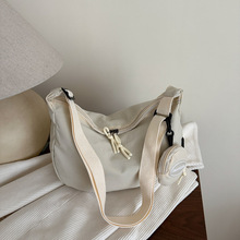 韩国ins软妹包包女2025新款潮简约纯色单肩斜挎包日系原宿饺子包
