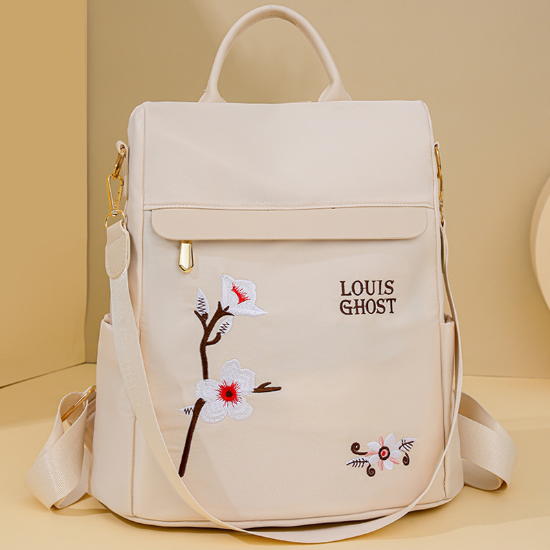 Comercio exterior al por mayor 2024 nueva moda bordada señoras mochila antirrobo al aire libre estilo occidental viaje mochila de viaje marea