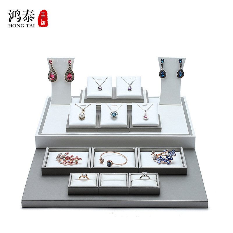 Hongtai high-end PU leather counter jewelry display props showcase display stand set 