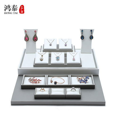 Hongtai high-end PU leather counter jewelry display props showcase display stand set 