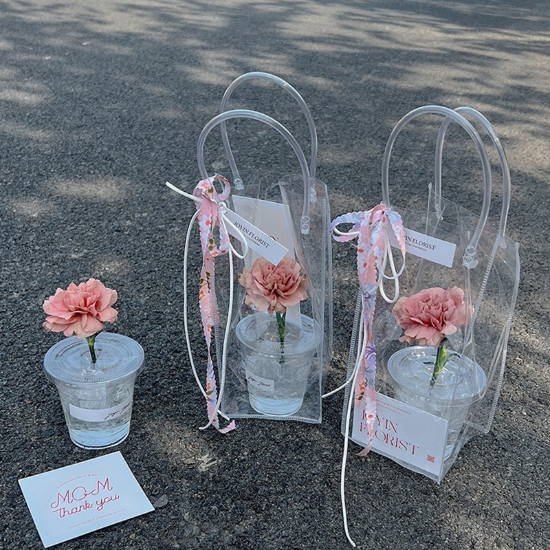 Bolsas de PVC transparentes al por mayor, bolsas de plástico personalizadas para cosméticos, bolsas de embalaje para compras, bolsas creativas personalizadas con diseño floral.