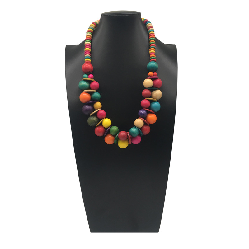 Collana etnica boho con perline in legno e guscio di cocco_voghion.com
