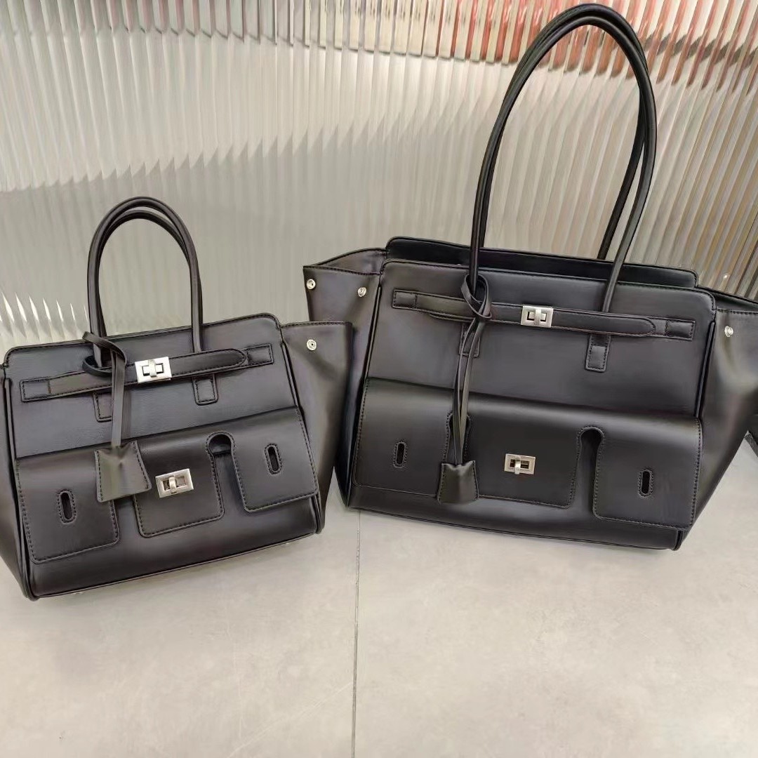 2024 nuevo bolso Tote con cerradura Roden de gran capacidad bolso de ala de motocicleta neutral bolso de hombro de cuero Tote bolso