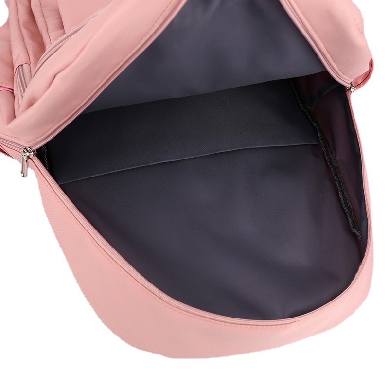 Venta al por mayor transfronteriza nueva mochila para estudiantes de primaria y secundaria mochila informal de gran capacidad para reducir la carga mochila de computadora de viaje de moda