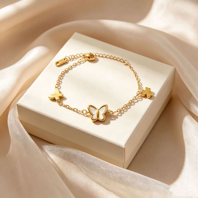 New light luxury white shell butterfly tassel clover titanium steel bracelet for women, exquisite new niche design fashion jewelry New light luxury white shell butterfly tassel clover titanium steel bracelet for women, exquisite new niche design fashion jewelry